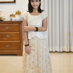 Shivangi Clothing Onam Sandal Breeze Traditional Pattu Pavadai