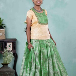 Shivangi Clothing Traditional Green Silver Garden Pattu Pavadai Set for Girls
