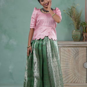 Shivangi Green Tissue Weave Traditional Pattu Pavadai Set for Girls