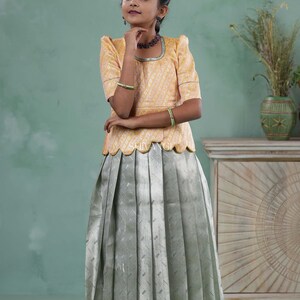 Shivangi clothing Grey Tissue Weave Traditional Pattu Pavadai Set for Girls