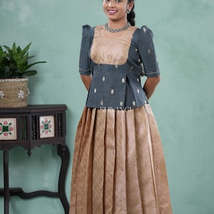 Shivangi clothing Traditional Sandal Floral Snail Pattu Pavadai Set for Girls