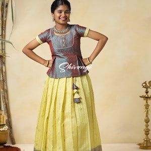 Shivangi clothing Girls Yellow Peacock Rain Pattu Pavadai Designs