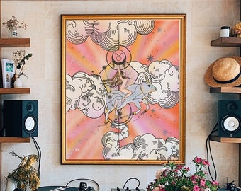 May include: A wooden table with a light wood finish sits in front of a wall with a bookshelf, a framed print, and a record player. The print is a colorful illustration of a zodiac sign with a pink background. The bookshelf is filled with books and has a woven rattan panel above it.