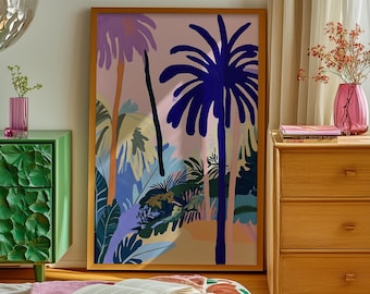 May include: A framed print of a colorful abstract illustration of palm trees and foliage in shades of blue, pink, and green. The print is hanging on a white wall above a wooden dresser.