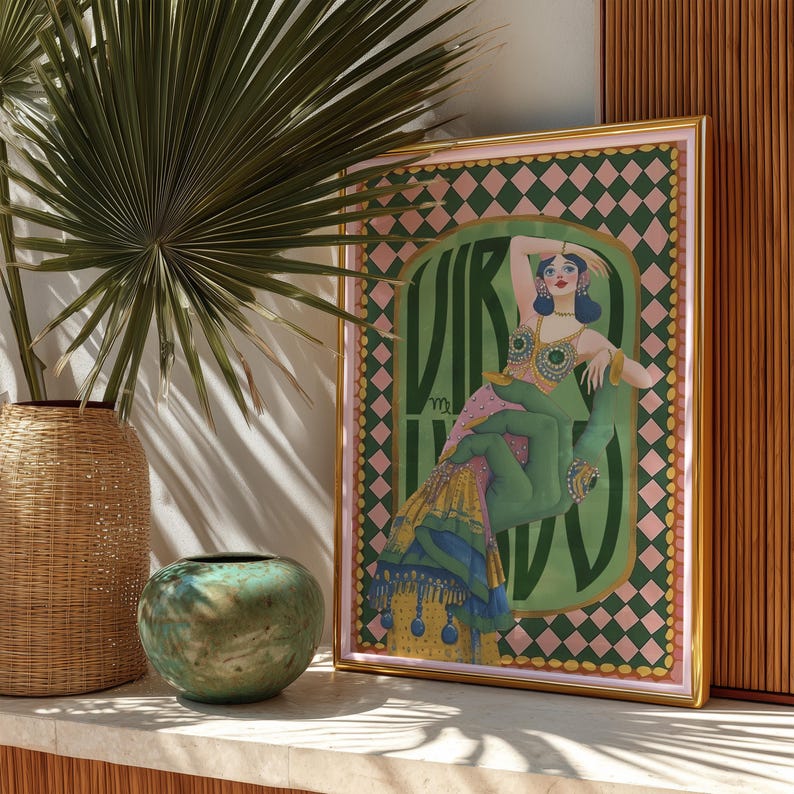 Virgo zodiac wall art featuring a dazzling, vintage-style showgirl held gracefully by a green hand, adorned in vibrant bejeweled fashion. Surrounded by bold “Virgo” lettering and a retro pink-and-green checkerboard frame, this mystical, feminine artwork is perfect for astrology lovers, coquette dorms, and magical bedroom spaces.