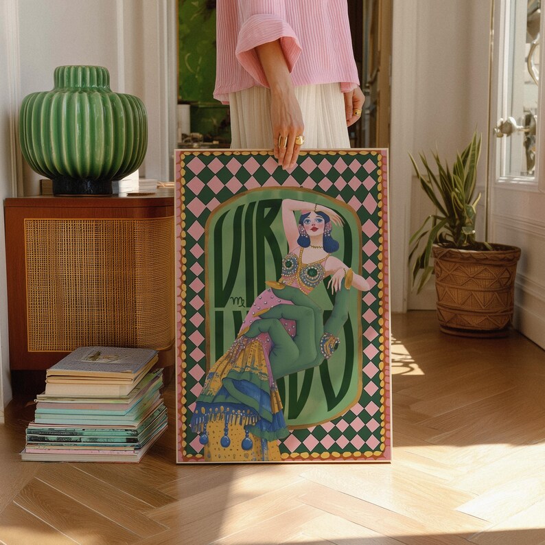 Virgo zodiac wall art featuring a dazzling, vintage-style showgirl held gracefully by a green hand, adorned in vibrant bejeweled fashion. Surrounded by bold “Virgo” lettering and a retro pink-and-green checkerboard frame, this mystical, feminine artwork is perfect for astrology lovers, coquette dorms, and magical bedroom spaces.