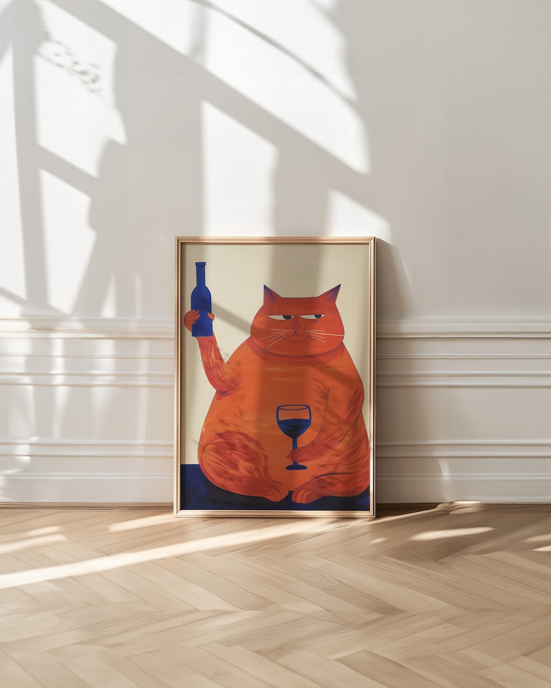 May include: A framed illustration of an orange cat holding a bottle of wine in one paw and a glass of wine in the other. The cat has a serious expression on its face.