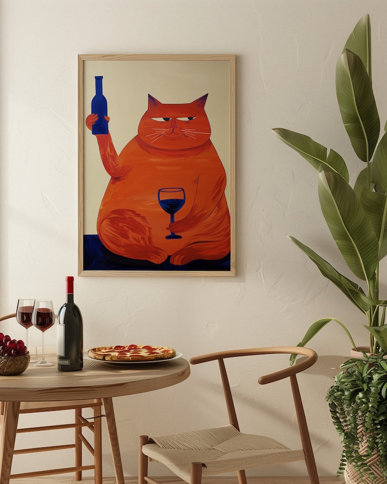 Large orange cat with a blue bottle in one paw and a blue glass in the other, against a beige background.