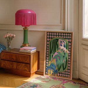 Virgo zodiac wall art featuring a dazzling, vintage-style showgirl held gracefully by a green hand, adorned in vibrant bejeweled fashion. Surrounded by bold “Virgo” lettering and a retro pink-and-green checkerboard frame, this mystical, feminine artwork is perfect for astrology lovers, coquette dorms, and magical bedroom spaces.