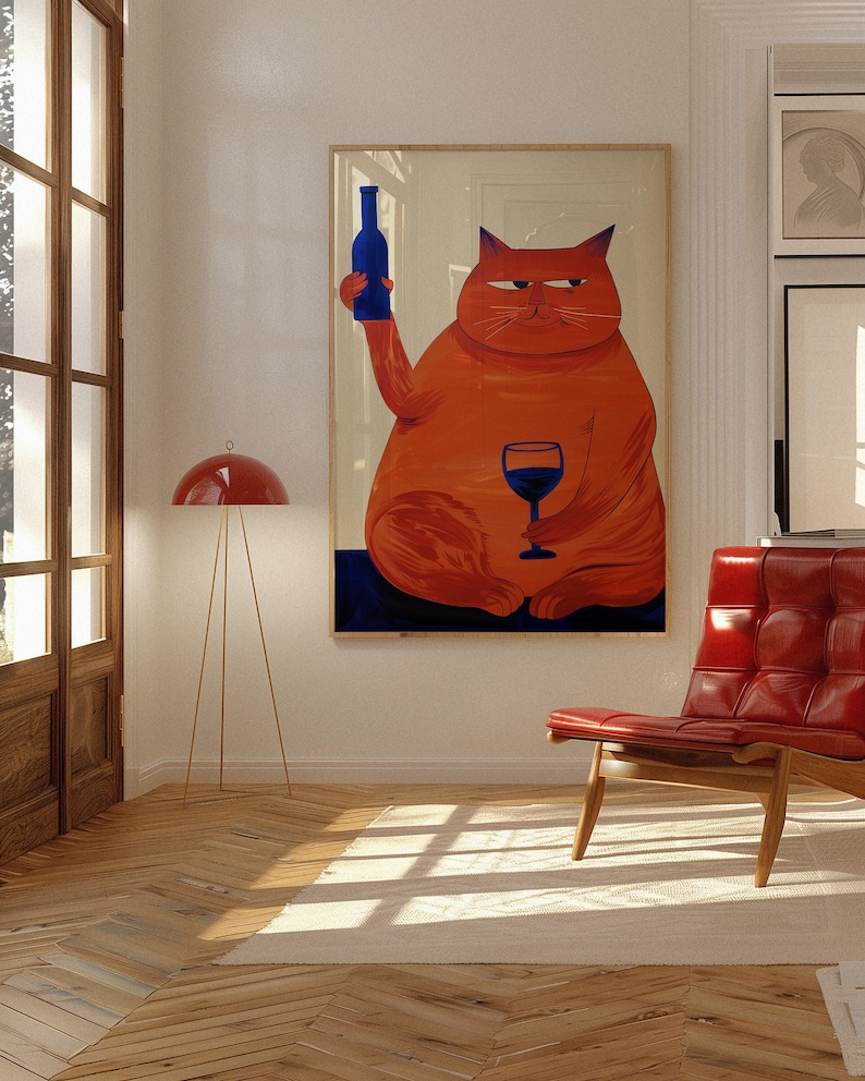Large orange cat with a blue bottle in one paw and a blue glass in the other, against a beige background.