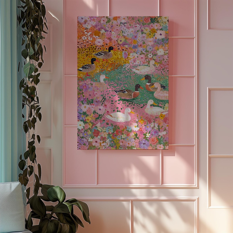 May include: A framed painting depicting ducks in a floral setting. The artwork showcases a vibrant mix of pink, yellow, and green hues, with detailed depictions of various duck species. The painting is displayed on a pink wall.