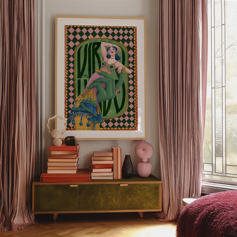 Virgo zodiac wall art featuring a dazzling, vintage-style showgirl held gracefully by a green hand, adorned in vibrant bejeweled fashion. Surrounded by bold “Virgo” lettering and a retro pink-and-green checkerboard frame, this mystical, feminine artwork is perfect for astrology lovers, coquette dorms, and magical bedroom spaces.