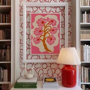 Flat-graphic illustration of a stylized orange tree trunk sprouting bright pink daisies on a cream blob shape against a vibrant pink background—cheerful, preppy and coquette-inspired.