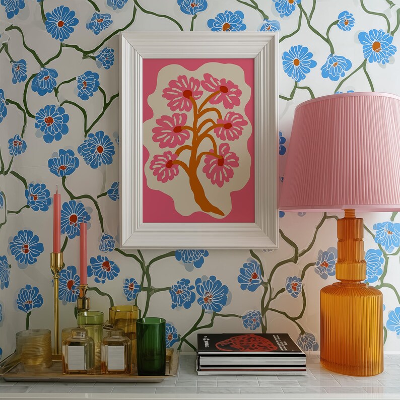 Flat-graphic illustration of a stylized orange tree trunk sprouting bright pink daisies on a cream blob shape against a vibrant pink background—cheerful, preppy and coquette-inspired.