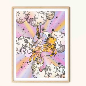 May include: A colorful illustration of a woman riding a lion with a pink, purple, and yellow background. The woman is wearing a crown and the lion has a mane. The illustration is surrounded by clouds and stars. The zodiac symbol for Leo is in the center of the image.