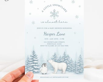 Könnte beinhalten: Eine Babyparty-Einladung mit Winterthema. Die Einladung zeigt einen Pinguin und einen Eisbären in einer verschneiten Waldszene. Der Text enthält "A Little Snowflake is Almost Here" und Details für die Babyparty von Harper Lane.