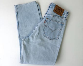Jeans Levi's 881 con etiqueta naranja estilo vintage • Talla T36/38