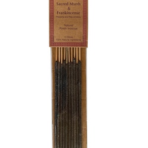 May include: A pack of 10 natural resin incense sticks with a brown label that reads "AUROSHIKHA Sacred Myrrh & Frankincense Relaxing and Rejuvenating Natural Resin Incense 10 Sticks 100% Natural Ingredients".