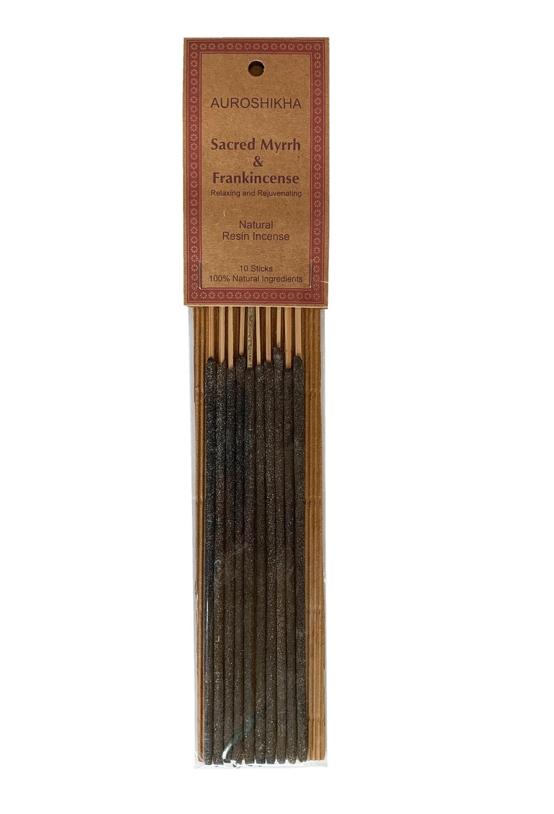May include: A pack of 10 natural resin incense sticks with a brown label that reads "AUROSHIKHA Sacred Myrrh & Frankincense Relaxing and Rejuvenating Natural Resin Incense 10 Sticks 100% Natural Ingredients".