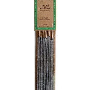 May include: A pack of 10 natural Gum Damar resin incense sticks. The packaging is brown with green borders and text that reads "AUROSHIKHA Natural Gum Damar Cooling and uplifting Natural Resin Incense 10 Sticks 100% Natural Ingredients".