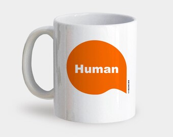 May include: White ceramic mug with a bright orange speech bubble that says "Human" in white text.