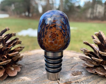 Handmade purple and pearlescent blue resin bottle stopper with real pine cone and stainless steel hardware