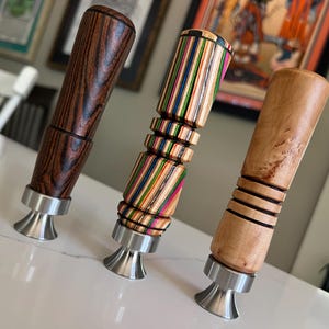 Handmade woodturned bottle opener. All are one-of-a-kind. Various wood available. Solid stainless hardware