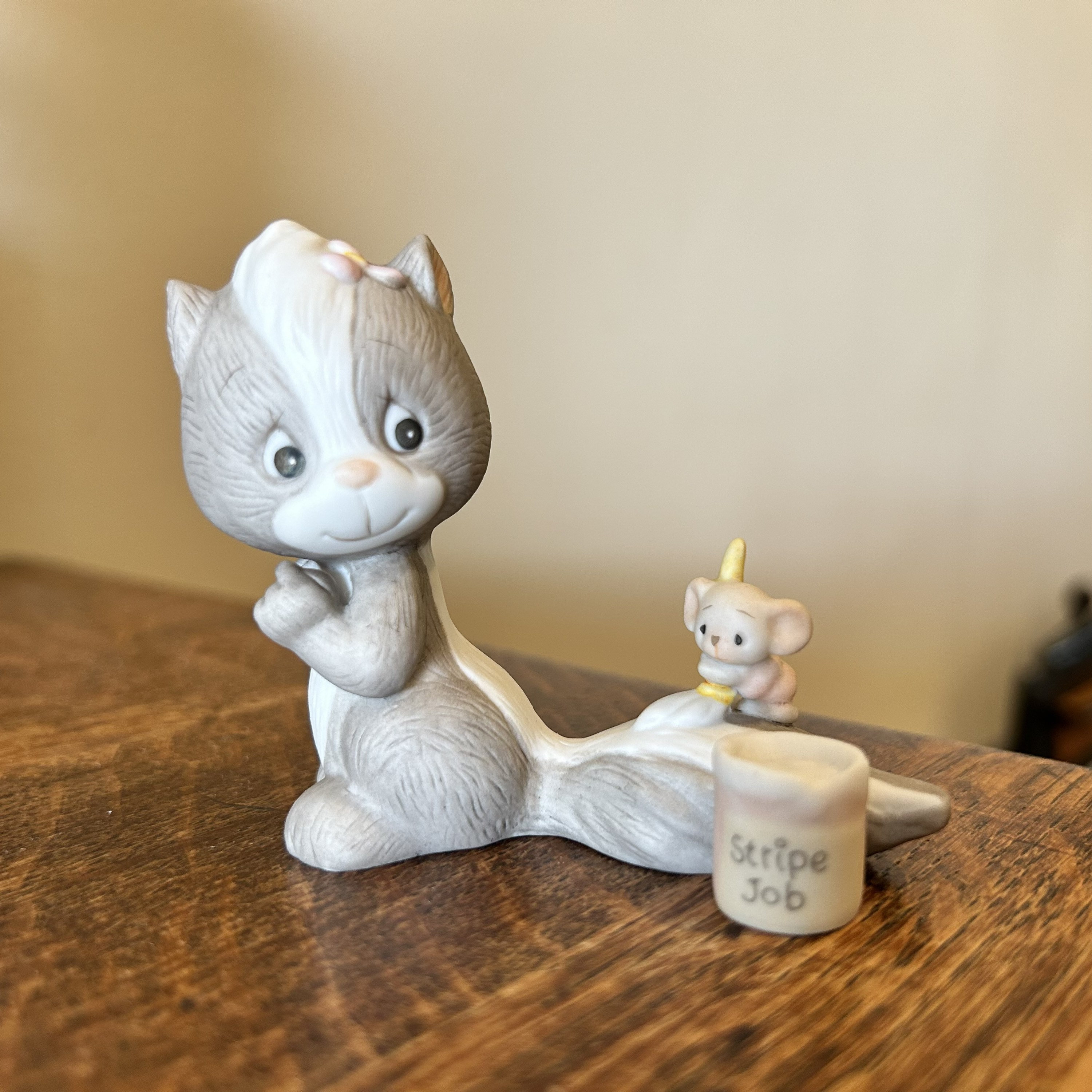Vintage Enesco Ceramic Figurine: Skunk and Mouse Stripe Job, 1987
