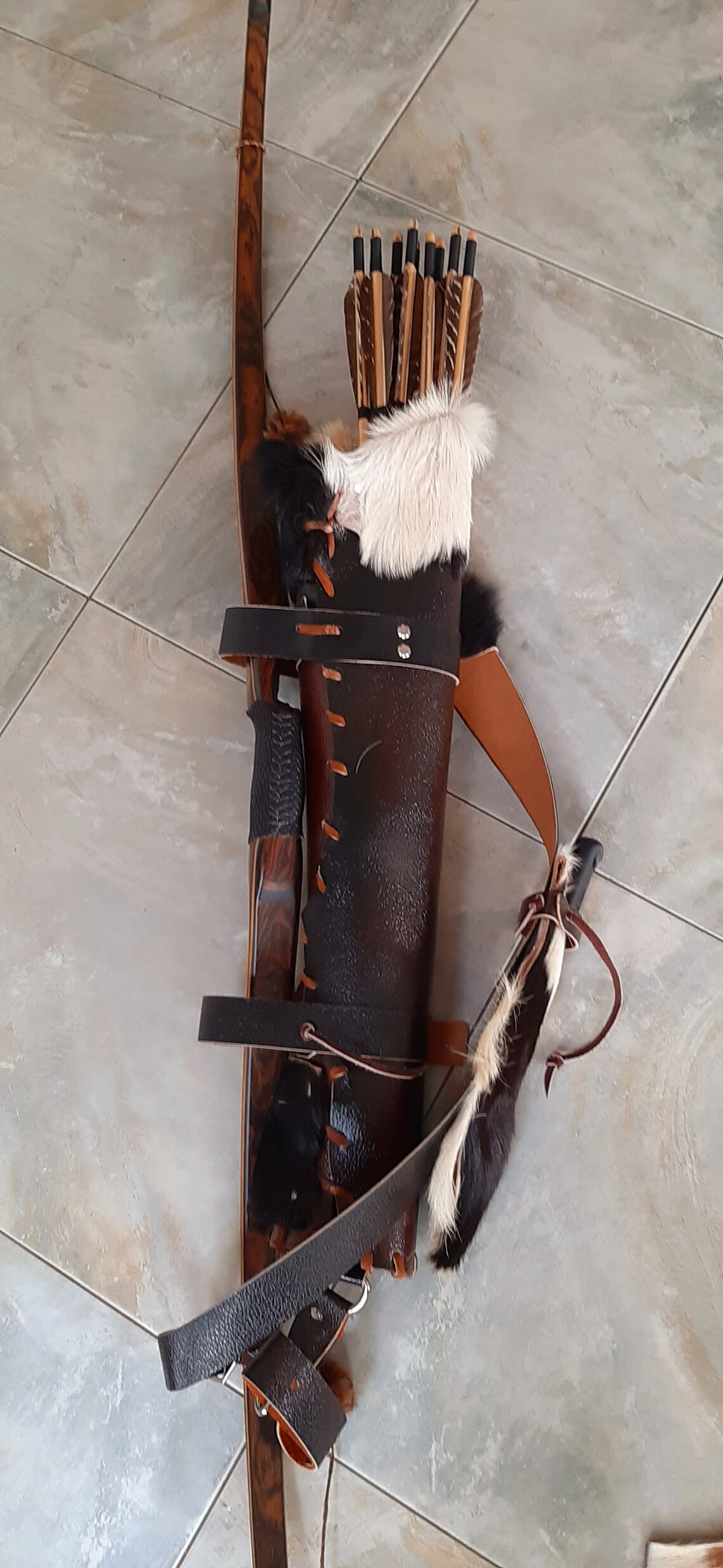 Arrow quiver with fur top and fur knife sheath attached to the Etsy