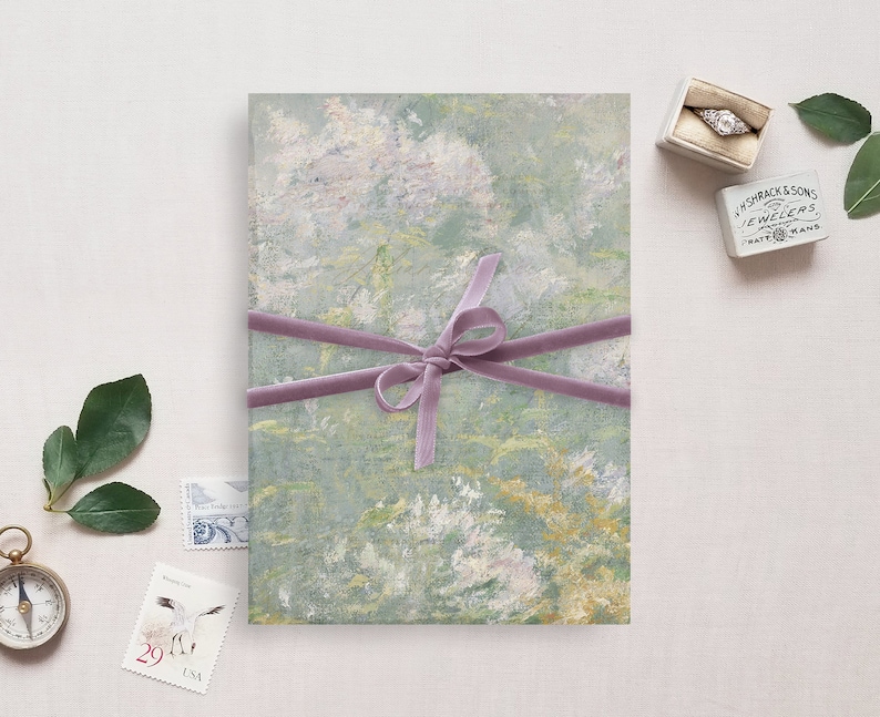 May include: A green and white abstract art print with a purple ribbon tied around it. The print is on a white background.