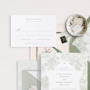 May include: A white wedding invitation with a green floral pattern. The invitation includes the names Lydia Isabella Stephens and Jeremy Andrew Williams, and the text "Together with the love of their families, invite you to celebrate their wedding."
