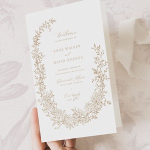 Modèle de programme de mariage imprimable avec couronne de fleurs dorées, ordre de service classique modifiable, carte de cérémonie numérique botanique or mat