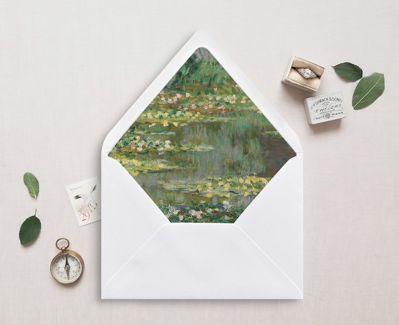 May include: A white envelope with a flap featuring a painting of a pond with water lilies. The painting is in shades of green, blue, and yellow.