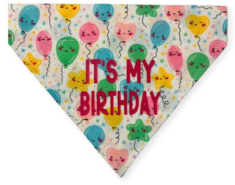 May include: White bandana with a colorful balloon pattern and the text "It's My Birthday".