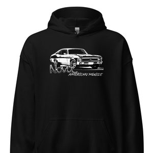 May include: Black hooded sweatshirt with a white graphic of a classic Chevrolet Nova muscle car. The text "Nova" and "American Muscle" are also printed in white.