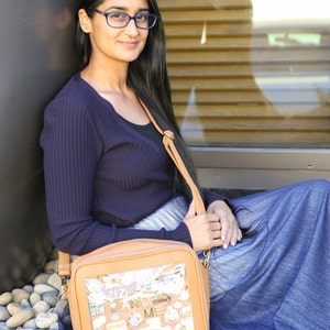 The Hollingworth Crossbody, Luxury Vegan leather ITA bag w/ clear vinyl display window & Insert for pin display. Pin collectors dream gift!