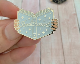 Adorable book enamel pin for introvert reading lovers! Great stocking stuffer gift for readers and for shy book addicts