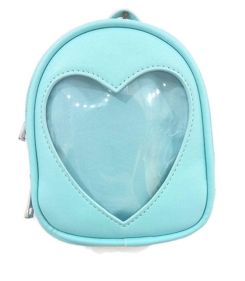 Mini ITA backpack for toddler/kids. Works as a pouch for adults w/insert & window to add pins, attach to bags, belts w/clasp. Vegan leather 