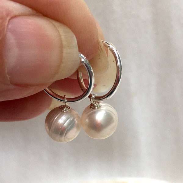 Pearl and silver hoop earrings, silver sleepers with pearl
