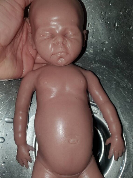 Womb 2024 baby doll