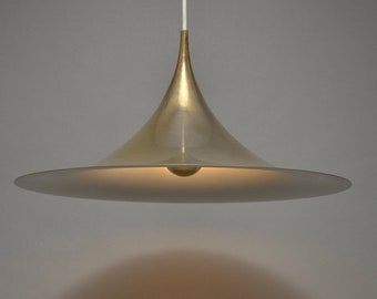 Vintage 1960s Authentic Fog & Mørup "Semi Pendant" by Bonderup and Thorup in desired brass version. Danish design