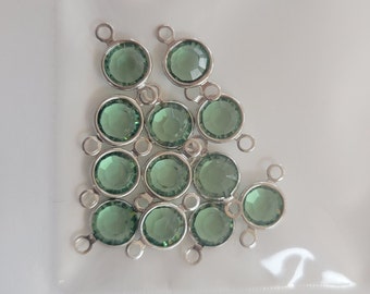 12 connecteurs Swarovski vintage plaqués argent avec lunette 6 mm.