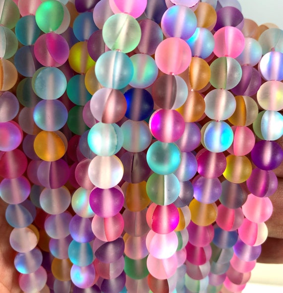 thumbnail interactive-video image 1 of River Valley Gems 15-Strand Matte Multicolor Mystic Aura Glass Round Beads 1 of 6