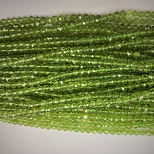 AAA Quality Peridot Round Faceted Beads  4 mm -  15 Inch Strand