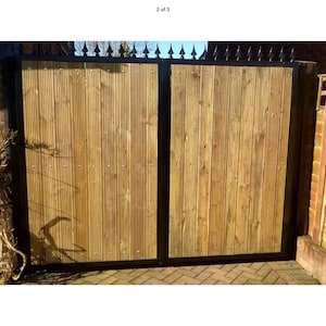 Brand new steel framed timber infil driveway gates