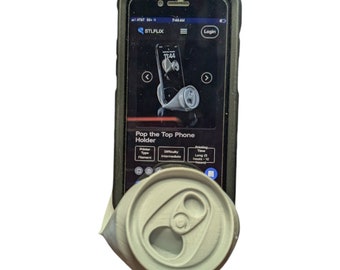 Crushed can phone holder