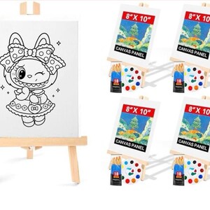 May include: A white canvas panel on a wooden easel featuring a black and white cartoon character. Four additional sets include canvas panels, paint palettes, and paintbrushes. Each canvas panel is labeled "8" X 10"" and "CANVAS PANEL".