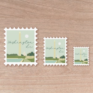 May include: Three postage stamps with a Washington D.C. design. The stamps feature a light green background with a depiction of the Washington Monument, the Capitol Building, and the text "Washington D.C." in a script font. The stamps are in different sizes.