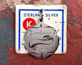 50s 60s NEW NWT VINTAGE Spencer Co. Graduation Day sterling silver pendant charm etched cursive round small thin marked delicate grad gift