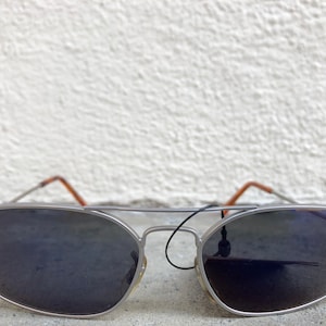 90s NEW NWT NOS Vintage sunglasses matte silver tone metal aviator frames reflective blue purple tinted lenses wide narrow geometric cyber